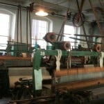 One of the 100 looms on a floor at the Boot Cotton Mill in Lowell, Massachusetts.