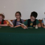 4 students role-playing selectmen at an 1831 Town Meeting in Lowell, Massachusetts.