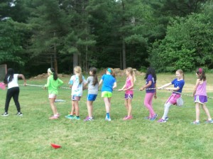 Some 4th graders participating in a tug-a-war competition.