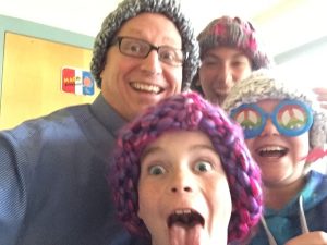 Our Teacher and 3 students wearing their newly traded homemade hats.